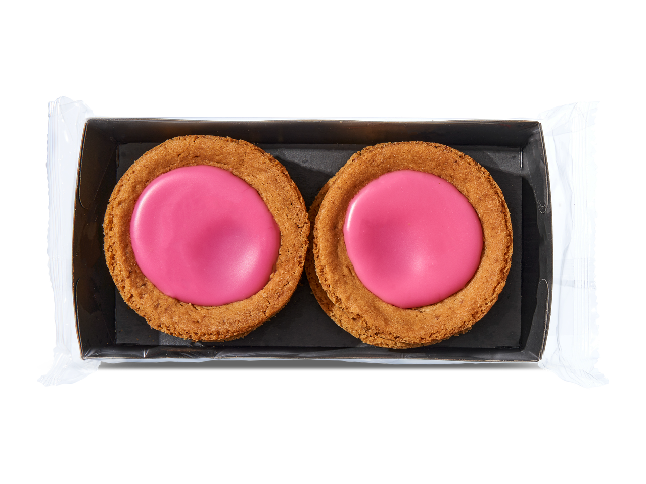 Twee roze koeken in een open verpakking, van bovenaf gezien.
