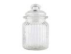A clear glass jar with vertical ribs and a glass lid.