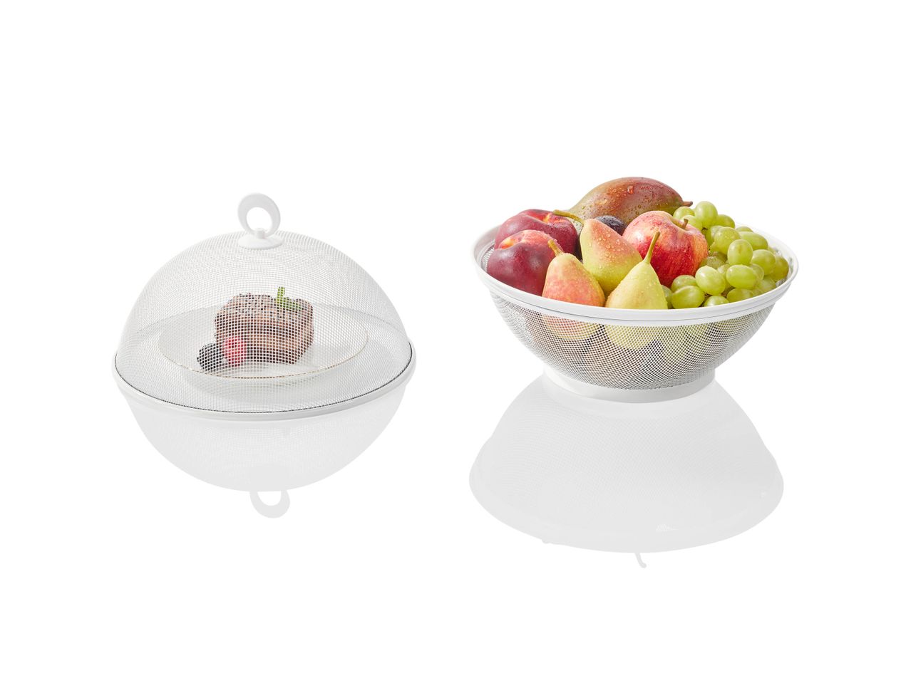 Un bol de fruits frais sous un dôme protecteur transparent.