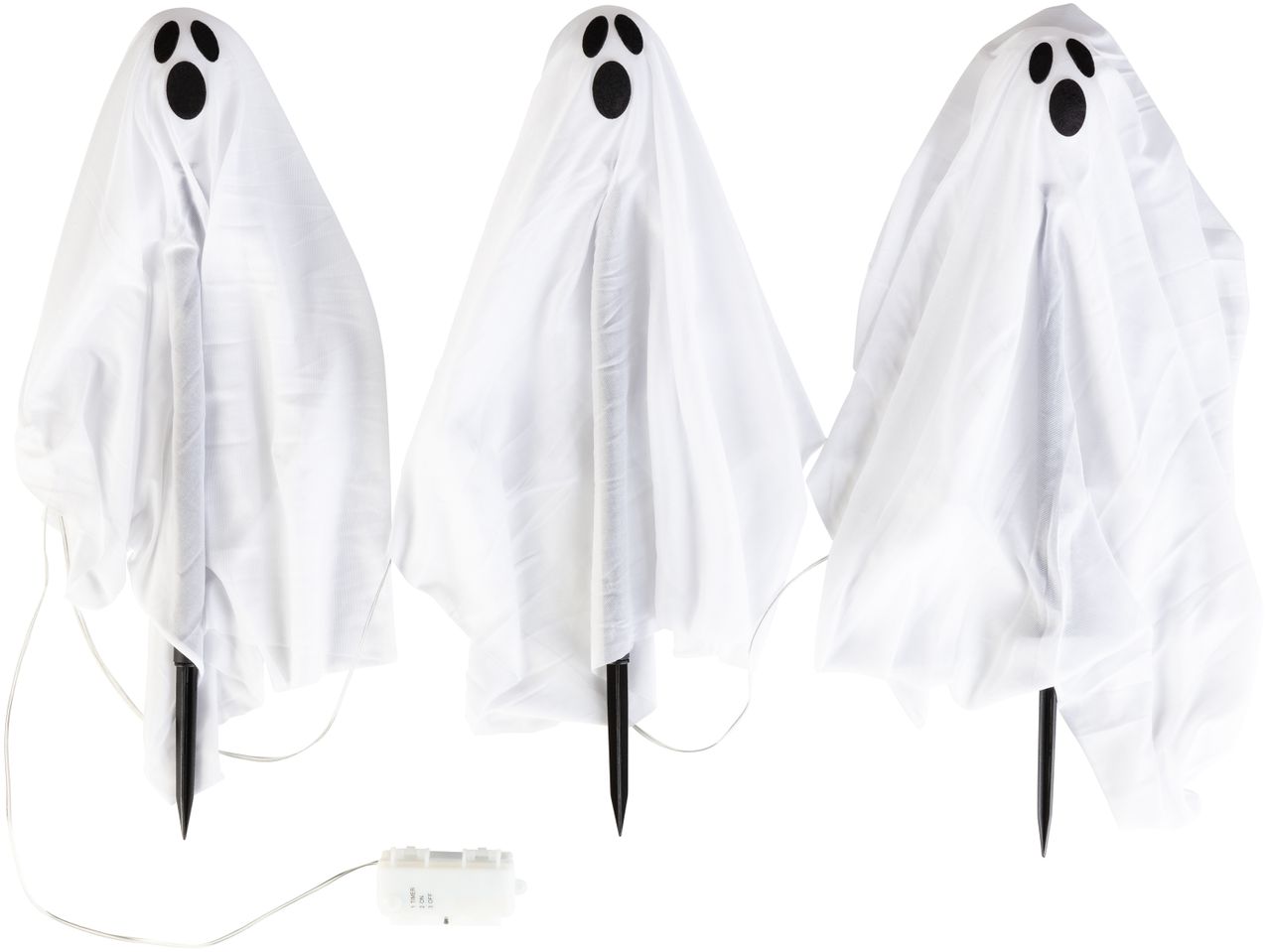 Three white ghost Halloween decorations with black faces and ground stakes
