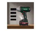 Cordless impact wrench with battery and four socket sleeves on a wooden surface