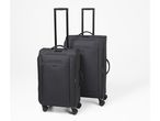 Two black soft-shell suitcases with telescopic handles and spinner wheels on a white background.