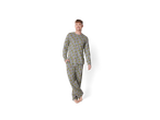 Man wearing grey Grinch pyjamas with a festive pattern