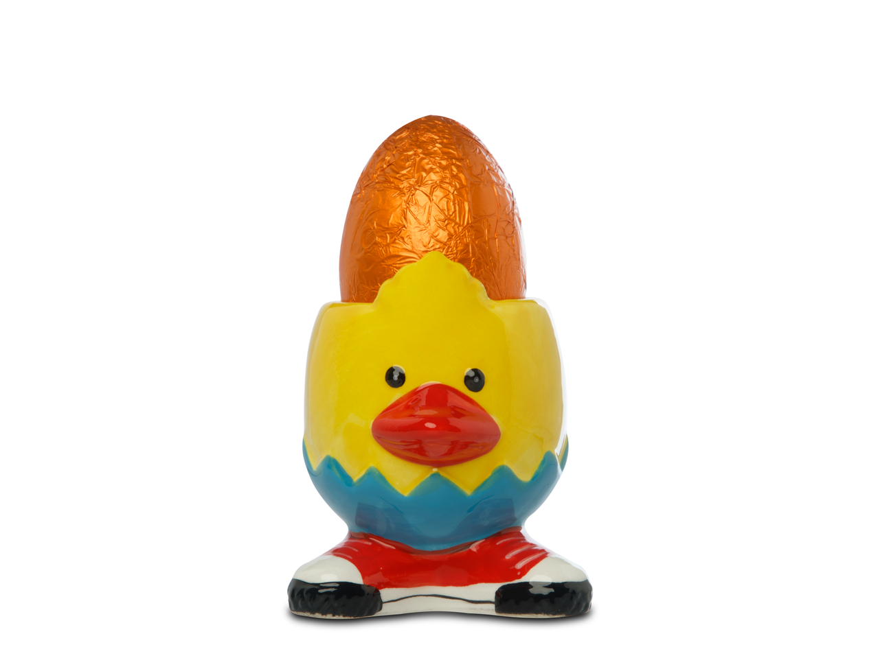 Chocolade paasei in een ei-houder met kuiken-vorm.