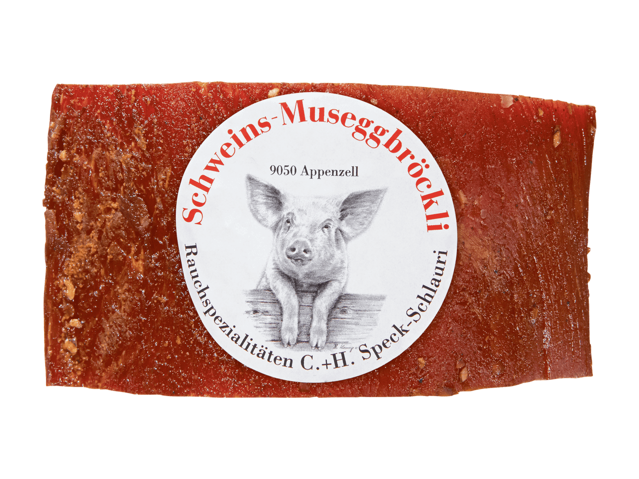 Lard fumé avec une étiquette ronde représentant un cochon et du texte en allemand.