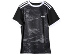 Kids' black training jersey with grey abstract pattern, white collar, and white stripes on sleeves.