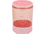Pink makeup brush cleaner with a hexagonal grid top and a MAX fill line.