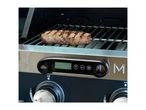 A steak grilling on a barbecue with a digital thermometer displaying 'Grill Meister'.