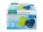 Zwei Packungen Sensiplast Fixierbandagen in Grün und Blau.