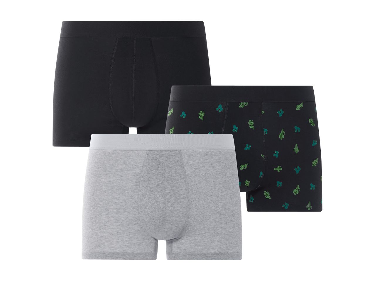 Un set di tre boxer da uomo: uno nero, uno grigio e uno nero con stampa di cactus.