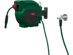 Wall-mounted automatic hose reel with a green hose connected to a tap.