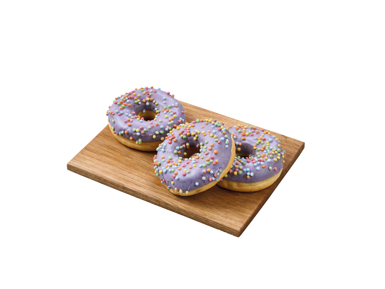 Kolm lilla glasuuri ja värviliste piserdistega sõõrikut puuplatil.