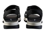 Pair of black and white sports sandals, rear view.