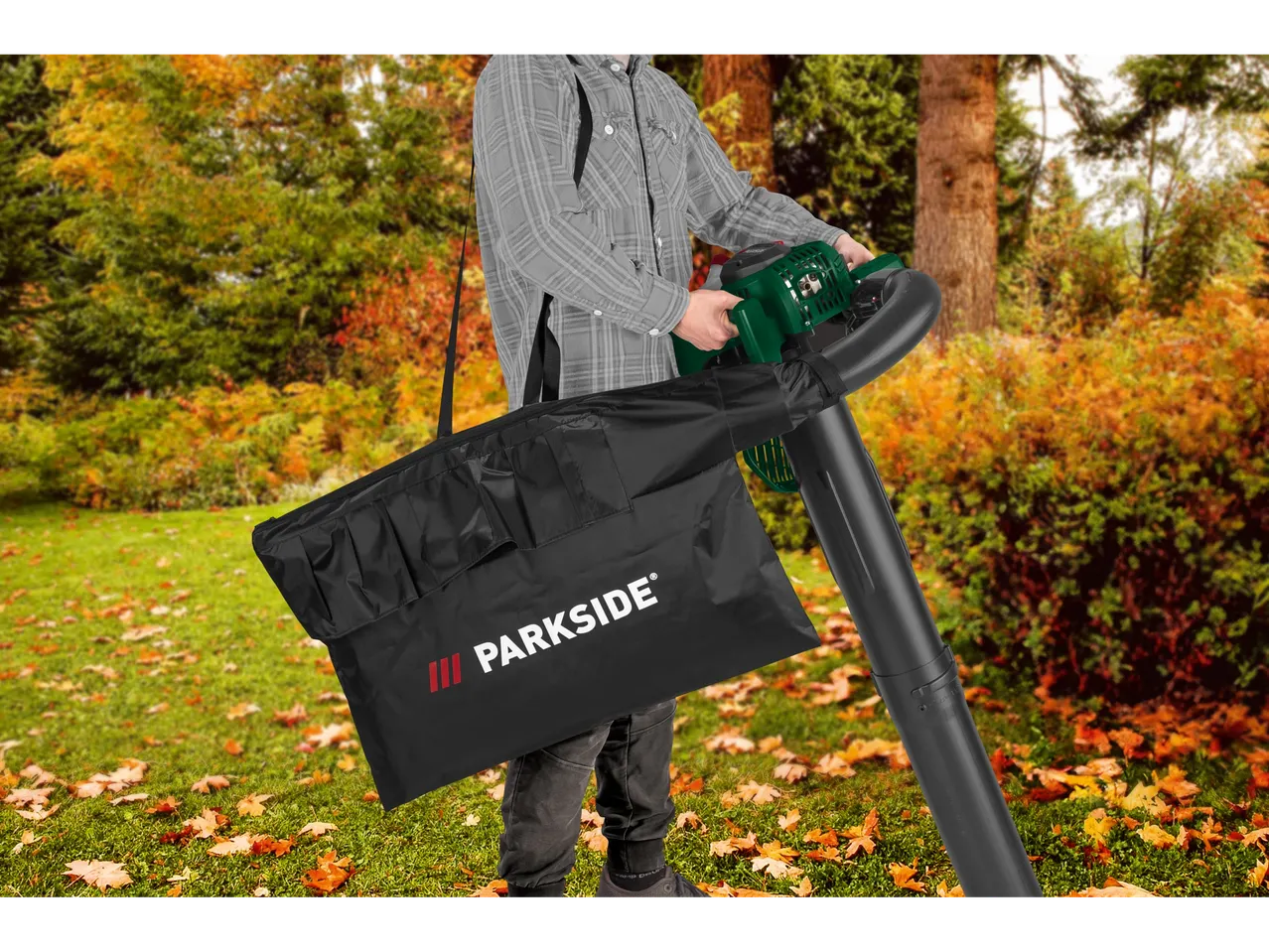 Parkside leaf blower and carrying bag for autumn garden cleanup.