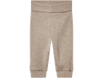 Beige stickade babybyxor.