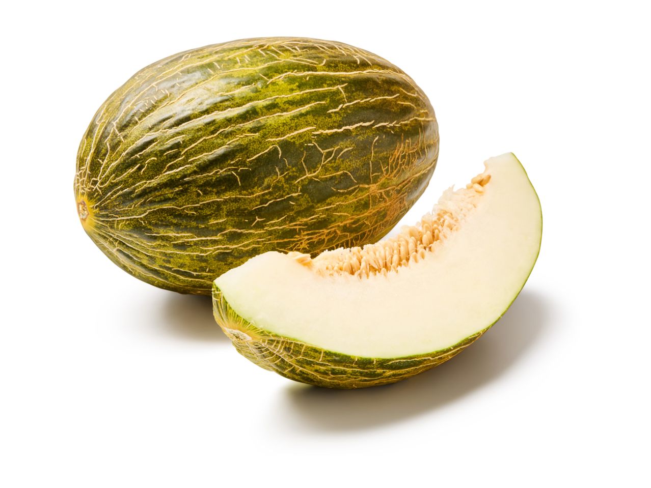 A whole Piel de Sapo melon and a slice of melon with seeds, on a white background.