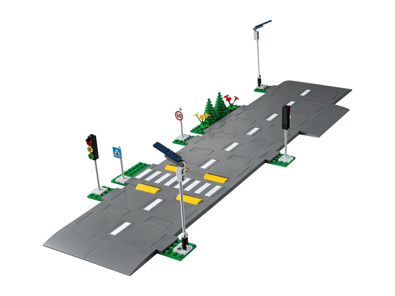 A Lego road plate with traffic lights, streetlights, and road signs.