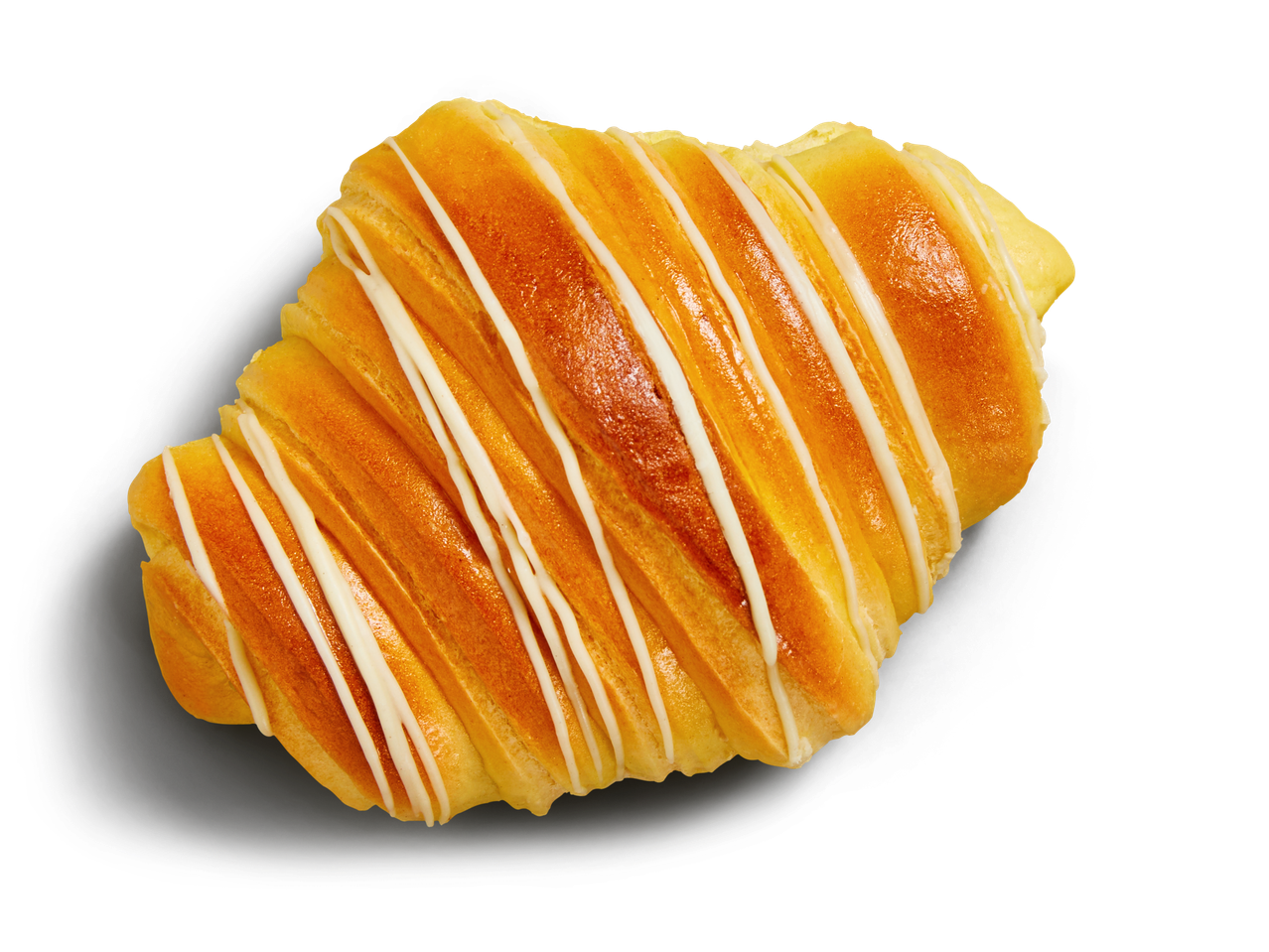 Ein goldbraunes Croissant mit darüber getröpfeltem weißen Zuckerguss liegt auf einer dunkelgrauen Unterlage.