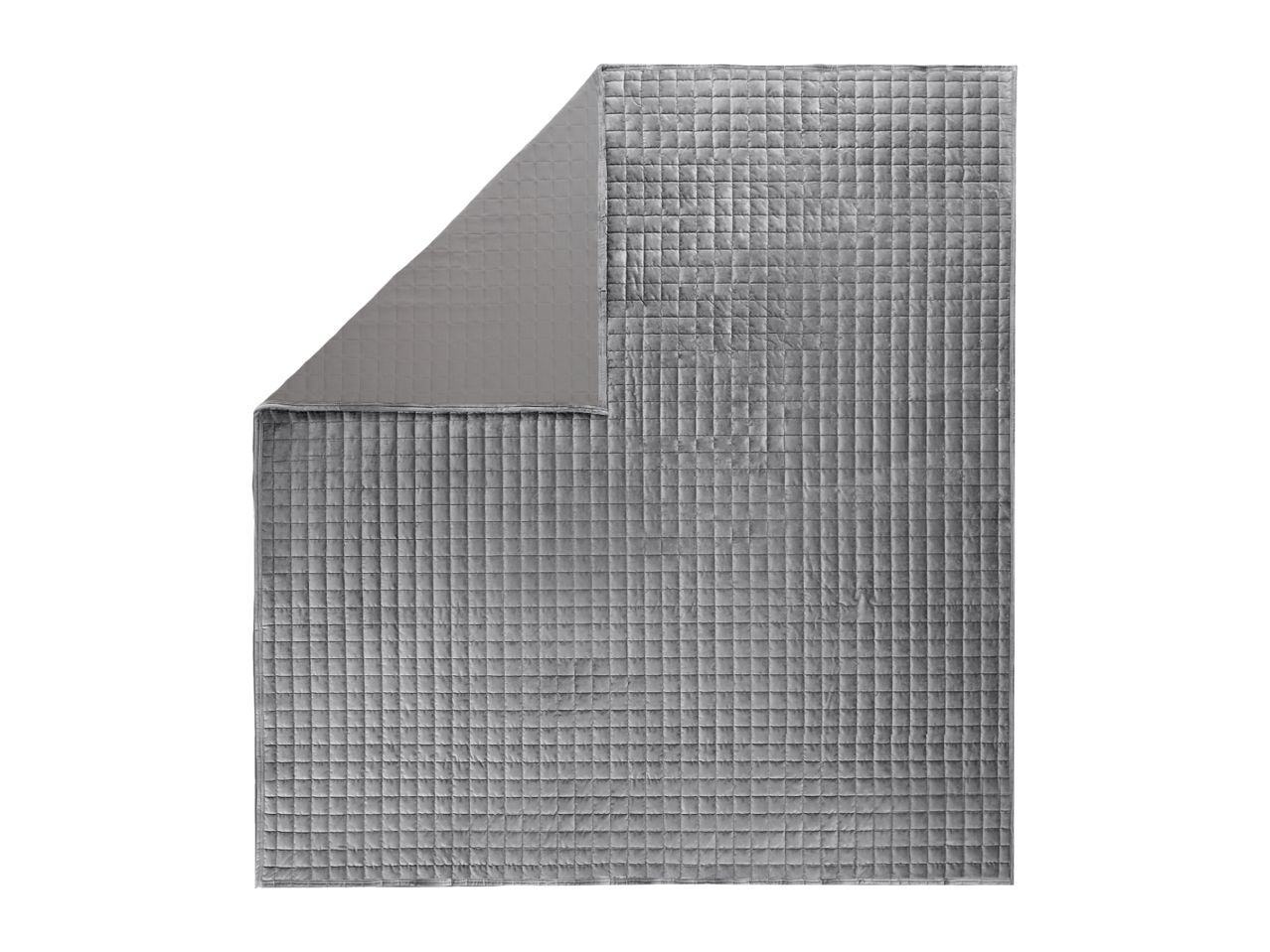 Grey quilted weighted blanket with a folded corner