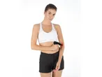 Woman uses VITALMAXX® Minimassagepistol on her arm.