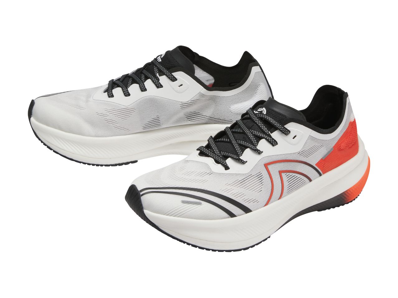 Two white and black athletic shoes with orange accents, one slightly behind the other.
