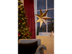 LIVARNO home LED Christmas Star Lantern in a festive room with a Christmas tree.