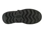 The bottom of a black shoe with a textured sole.
