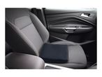 Black car seat cushion on a car seat with white stitching