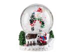 Christmas snow globe with a snowman holding a tree and another on a sled