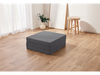 Gray folding mattress on a light wood floor.