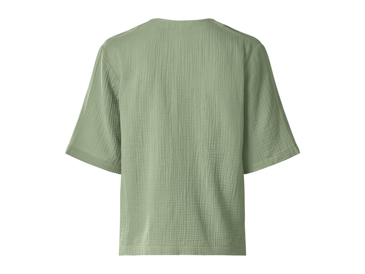 Back view of a light green short-sleeved top with a textured fabric.
