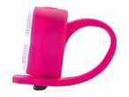 Pink silicone bike light with a clear lens.