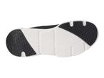 Black and white athletic shoe sole with textured grip patterns.