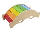 Wooden rainbow rocker with colorful slats, angled view.