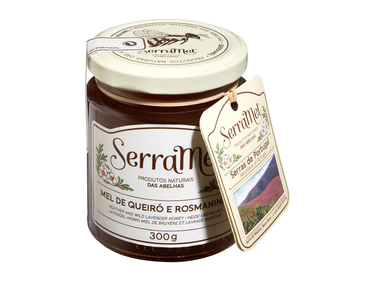Jar of heather and wild lavender honey with a decorative tag featuring a mountain landscape.