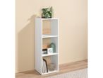White and wood-look Shelving Unit With 3 Compartmens with decorative items in a room with a light wall.