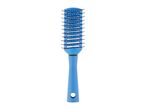 A blue paddle hairbrush with a comfortable handle stands upright against a white background.