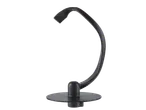 Suporte de plástico preto para relógio ou pulseira em fundo preto.