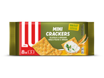 Verpakking mini crackers met olijfolie en oregano, met een cracker belegd met roomkaas.