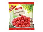 Frozen strawberries in a bag with cooking instructions.