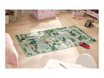 A children's playmat with roads and buildings, featuring toy cars, in a bright room.