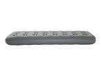 Grey inflatable air mattress with tufted surface.