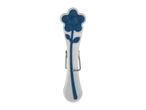 White clothes peg with a blue flower design