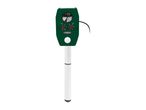 Green ultrasonic animal repeller with a white stake, featuring sensitivity and frequency dials.