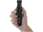 Hand holding a black electric beard trimmer with blue text and a power button.