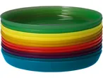 A stack of colorful plastic plates in a rainbow pattern.