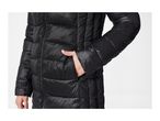 Close-up of a person wearing a black puffer jacket with their hand in the pocket