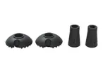 Two black rubber trekking pole baskets and two black rubber pole tips.