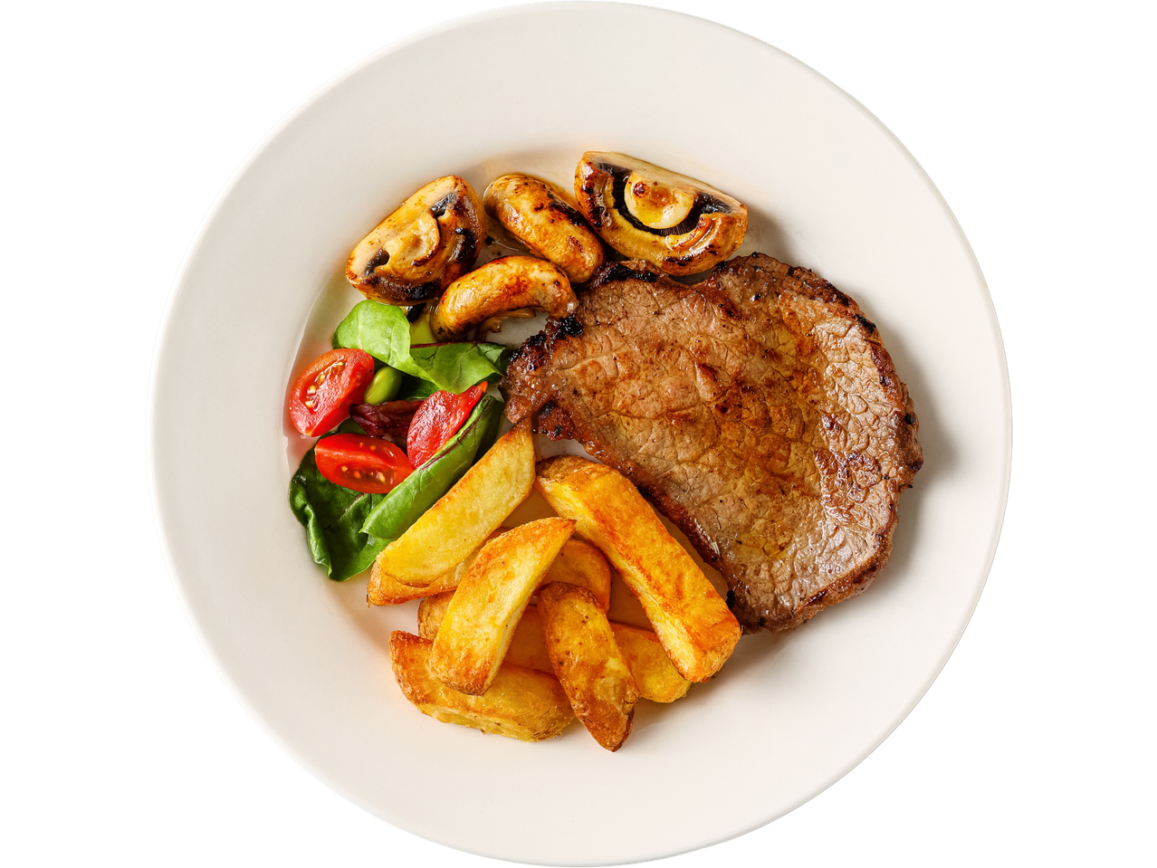 Grilled Irish beef minute steak with chips, mushrooms, and a side salad.
