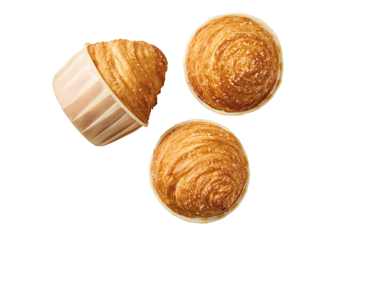 Trois cruffins dorés au sucre, un incliné et deux vus de dessus.